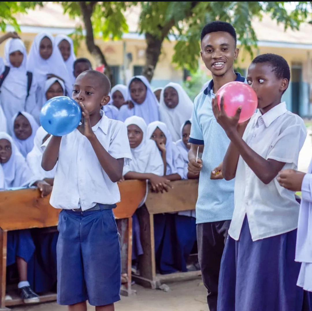 Young adults leading STEM activities